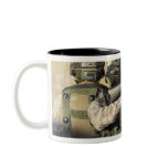 An infantry scout aims his weapon coffee mugs