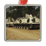 An M-88 recovery vehicle begins to tow an M992 Ornament
