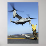 An MV-22 Osprey launches from the USS Nassau