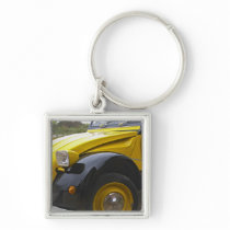 An old black and yellow Citroen 2CV 2 CV,