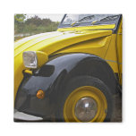 An old black and yellow Citroen 2CV 2 CV,