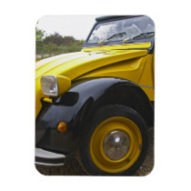 An old black and yellow Citroen 2CV 2 CV,