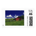 an old red barn on a hot summer day postage by bhbphotos an old red barn on a hot summer day postage