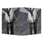 An RC-135 Rivet Joint Reconnaissance aircraft binders