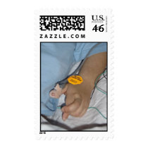 Andy with his fingers crossed stamps