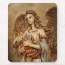 Angel carrying a harvest basket of fruits mouse pads