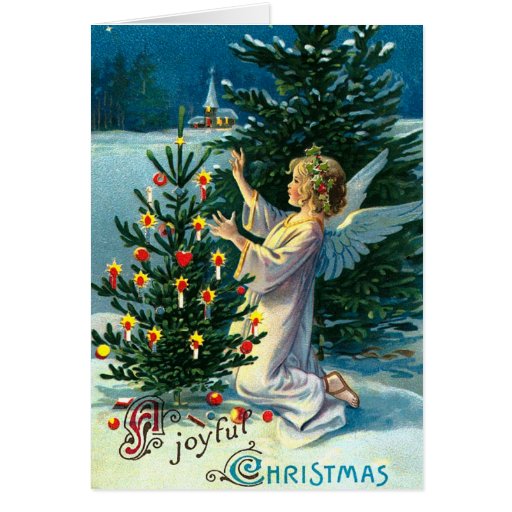 Angel Decorating Christmas Tree 2 Greeting Cards from Zazzle.