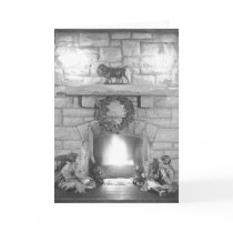 Annice and Margot Belden sitting by a fireplace at cards