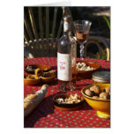 Aperitif and appetizers prepared: bread, olives, greeting card