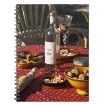 Aperitif and appetizers prepared: bread, olives, notebook