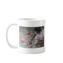 Applying the kolam powder mugs