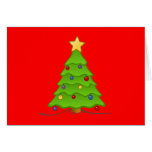 Árbol de navidad con las chucherías y la estrella tarjetas