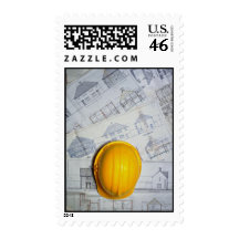 Architect's cap and plans stamps