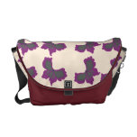 Artistic butterfly design over antique white messenger bags