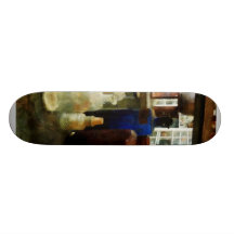 Assorted Chemicals in Bottles Skateboard Decks