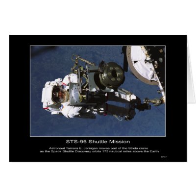 Astronaut Tamara E. Jernigan moves part of the Str Card by Space_Exploration