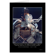 Astronauts van Hoften and Nelson repair (SMMS) NAS Cards