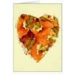 Autumn leaves in a heart shape, blank greeting card