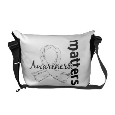 Awareness Matters 7 Retinoblastoma Courier Bags by awarenessgifts