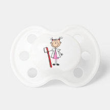 Ayudante de dentista con el cepillo de dientes