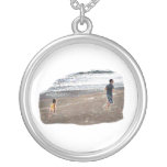 Baby Chasing Man on Beach Art Pendant