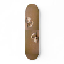 Baby chicks on gold background skate board
