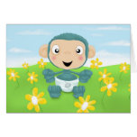 baby chimp in field of flowers greeting cards