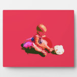 baby sitting and playing pink easter posterized co photo plaques