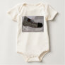 Baby with hockey skate