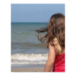 Back view of young girl at a Florida beach Poster
