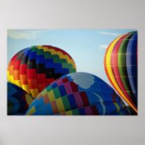Balloons flying in sky posters