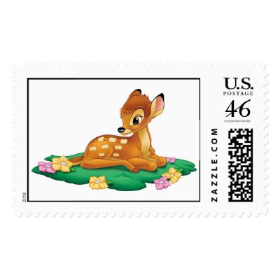 Bambi sitting on the grass postage