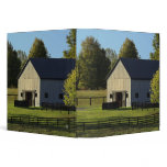 Barn on thoroughbred horse farm at sunrise, binder