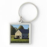 Barn on thoroughbred horse farm at sunrise, key chains
