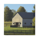 Barn on thoroughbred horse farm at sunrise, fridge magnet
