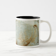 Bas-relief of an anthropomorphic bull coffee mug