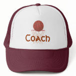 Basketball and net, with Coach on sports hat.