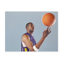 Basketball player balancing ball on one finger post cards