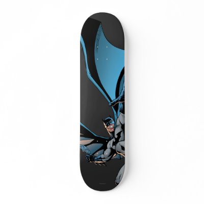 Batman hand in foreground skateboards