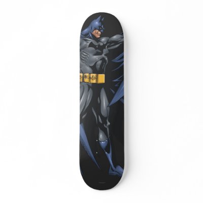 Batman holds cape - side skateboards
