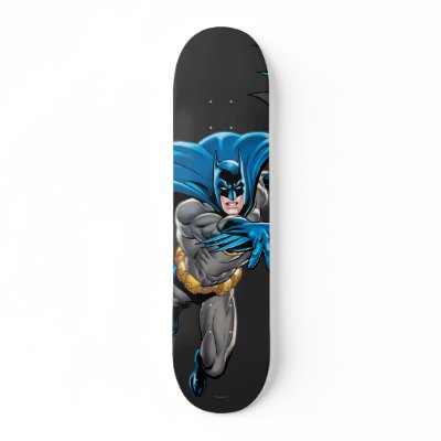 Batman throws batarang skateboards