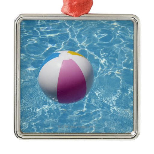 Beach ball in swimming pool square metal christmas ornament Zazzle