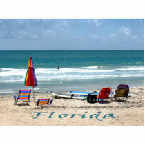 beach chairs surfboards umbrellas sand ocean photo cutout