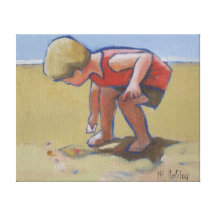 Beach child boy findng shell in the sand gallery wrapped canvas