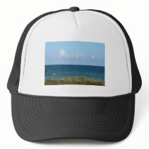 Beach dune with blue water and sky, Florida Hat