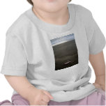 Beach litter plastic doll leg with sunrise tee shirts