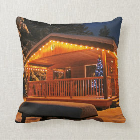 Beautiful Christmas Lights on Log Cabin in Snow Throw Pillows