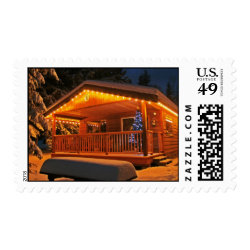 Beautiful Christmas Lights on Log Cabin in Snow Postage