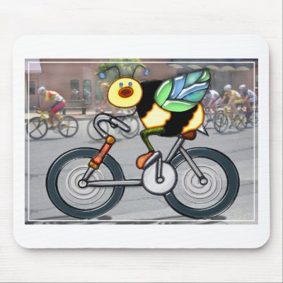Bee on a Bike in a Race Mouse Pads by ElainePlesser