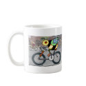 Bee on a Bike in a Race mugs